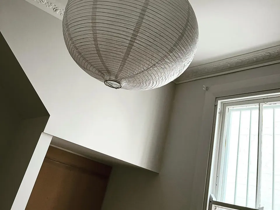 Paper lantern pendant in a bright room