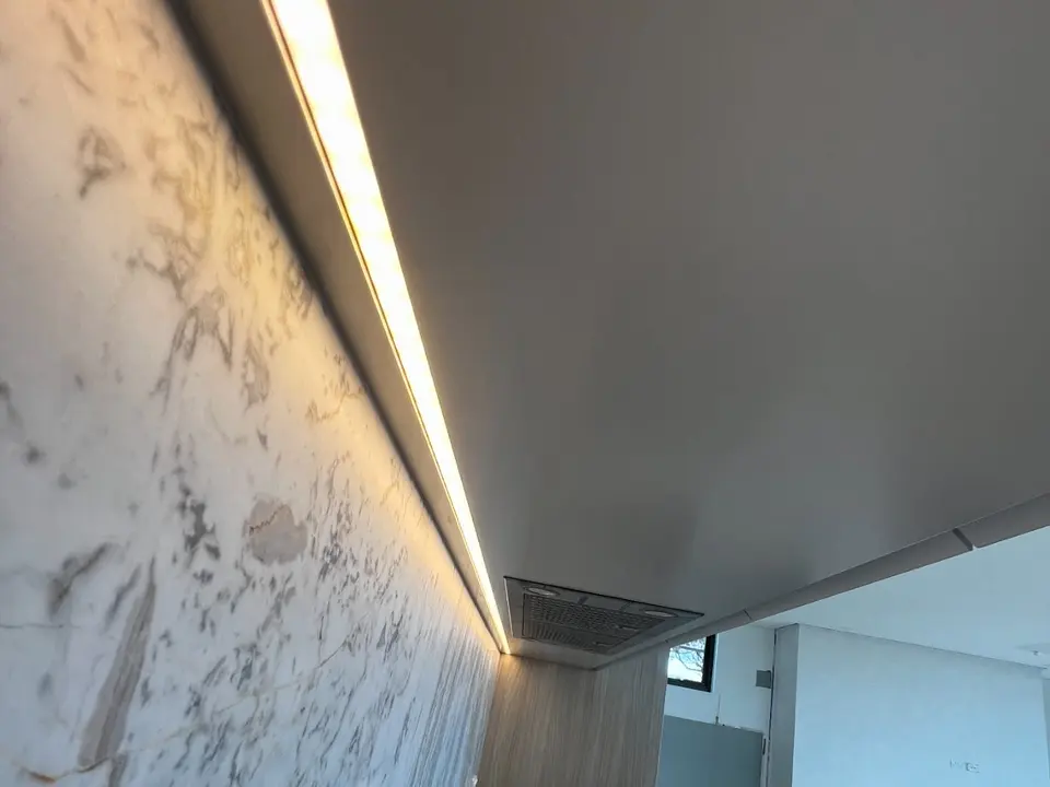 Kitchen LED strip over a marble splashback