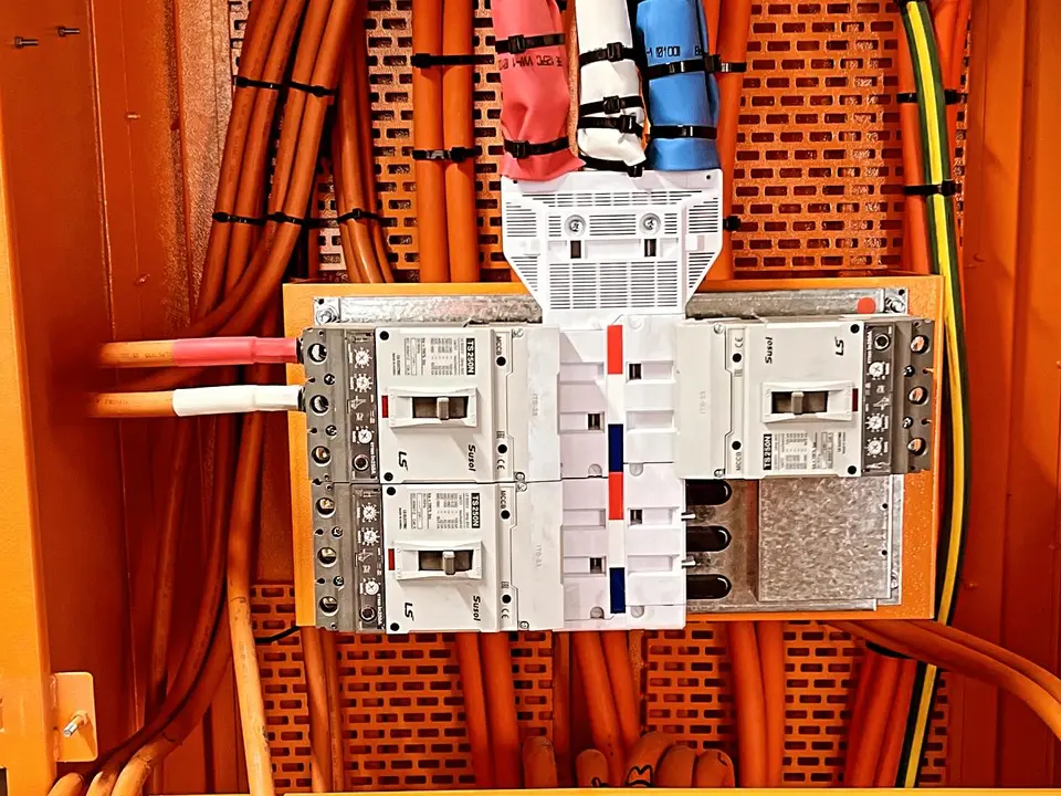 Main switchboard with orange cabling